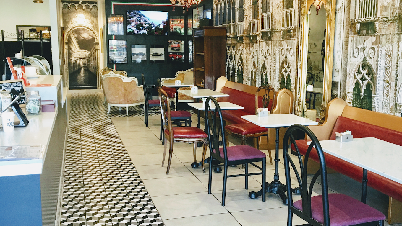 Cozy interior of Caffè Tre Venezie offering authentic Italian coffee in Torrance