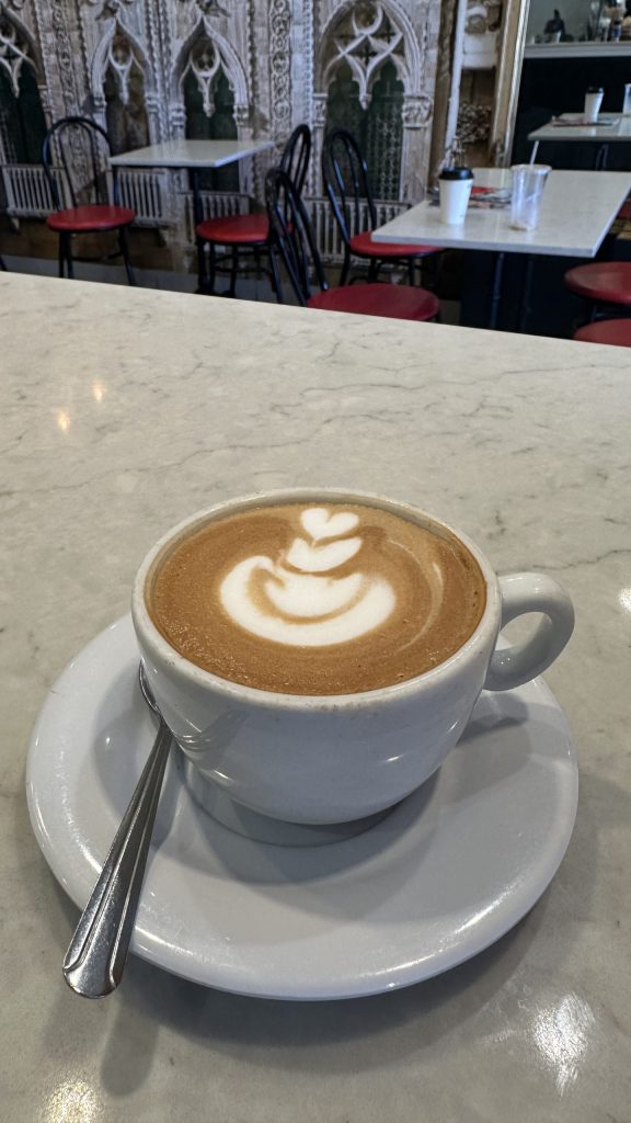 Cappuccino with latte art made using authentic Italian coffee